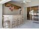 Outdoor bar with stylish stools, and a view to the pool and patio at 1441 Olde Kensington Ln, Deltona, FL 32725
