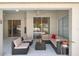 Relaxing screened-in patio area with comfortable seating at 1441 Olde Kensington Ln, Deltona, FL 32725