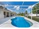 Relaxing screened-in pool with clear blue water and ample patio space at 1441 Olde Kensington Ln, Deltona, FL 32725
