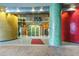 Attractive building entrance with vibrant mosaic columns and a glass doorway at 155 S Court Ave # 1305, Orlando, FL 32801