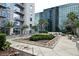 Beautiful courtyard with lush landscaping and comfortable seating areas at 155 S Court Ave # 1305, Orlando, FL 32801