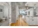 Open concept interior highlighting concrete architectural features and luxury vinyl plank flooring at 155 S Court Ave # 1305, Orlando, FL 32801