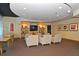 Inviting lounge area with comfortable seating and a large TV, perfect for relaxation at 155 S Court Ave # 1305, Orlando, FL 32801
