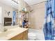 Cozy bathroom featuring a tiled shower/tub combo, vanity, and a mirrored medicine cabinet at 1612 Sandy Point Sq # 56, Orlando, FL 32807