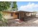 Backyard view with patio and green space at 17 W Nightingale St, Apopka, FL 32712