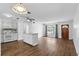 Open floorplan of kitchen flowing into living room, boasting great natural light at 17 W Nightingale St, Apopka, FL 32712