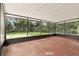 Enclosed sunroom with outdoor views for relaxing and entertaining at 17 W Nightingale St, Apopka, FL 32712