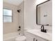Bathroom featuring modern fixtures, a shower and tub, and natural light at 1861 E Glancy Dr, Deltona, FL 32725