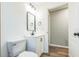 Half bath featuring modern fixtures and lighting at 1861 E Glancy Dr, Deltona, FL 32725