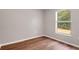 Bedroom featuring wood-look flooring and natural light at 1861 E Glancy Dr, Deltona, FL 32725