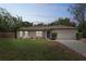 A beautiful single-story home, enhanced by a lovely sky at 1861 E Glancy Dr, Deltona, FL 32725
