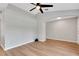 Spacious living room boasting wood floors, neutral paint, and a view of the entry hall at 1861 E Glancy Dr, Deltona, FL 32725