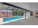 Enjoy the private screened-in pool area, perfect for relaxation and entertaining in your backyard oasis at 1861 E Glancy Dr, Deltona, FL 32725