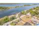 Aerial view showcasing the waterfront property and surrounding community and waterways at 2384 John Anderson Dr, Ormond Beach, FL 32176