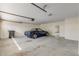 Garage featuring a parking space, painted walls, and a doorway to the home at 2384 John Anderson Dr, Ormond Beach, FL 32176