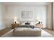 Luxurious main bedroom featuring a neutral color palette, decorative wall trim, and recessed lighting at 2422 Musselwhite Ave, Orlando, FL 32804