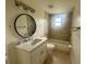 Bathroom featuring a tiled shower/tub, modern vanity with quartz countertop at 2514 Highlawn Ave, Sanford, FL 32773