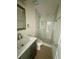 Bathroom featuring new marble shower, modern vanity, and new fixtures at 2514 Highlawn Ave, Sanford, FL 32773