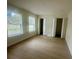 Bright bedroom with lots of light, wood flooring, and closet space at 2514 Highlawn Ave, Sanford, FL 32773