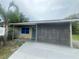 Cozy single-story home with a palm tree in the front yard at 2514 Highlawn Ave, Sanford, FL 32773