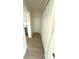Hallway features hardwood floors and large storage closet at 2514 Highlawn Ave, Sanford, FL 32773