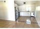 Modern kitchen featuring white cabinetry, stainless steel appliances, and updated countertops and backsplash at 2514 Highlawn Ave, Sanford, FL 32773