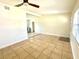 Spacious living room featuring tile flooring, with an eat-in-kitchen off to the side at 2514 Highlawn Ave, Sanford, FL 32773