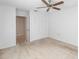 Carpeted bedroom with ceiling fan and double closet doors, offering ample storage options at 262 W Sabal Palm Pl, Longwood, FL 32779