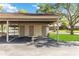 Assigned carport with storage units for residents convenience, enhancing community living at 262 W Sabal Palm Pl, Longwood, FL 32779