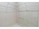 Walk-in closet with tiled flooring and adjustable wire shelving for optimal storage solutions at 262 W Sabal Palm Pl, Longwood, FL 32779