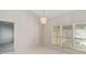 Open dining room featuring a chandelier and lots of natural light at 262 W Sabal Palm Pl, Longwood, FL 32779