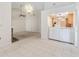 Open dining room view featuring a chandelier and view to the living room at 262 W Sabal Palm Pl, Longwood, FL 32779