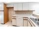 Classic kitchen with bright white cabinets and an undermount double sink at 262 W Sabal Palm Pl, Longwood, FL 32779