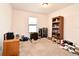 Bedroom with carpet and toys, and a window with white blinds, and a wood dresser and bookshelf at 35734 Rose Moss Ave, Leesburg, FL 34788