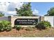 Elegant community entrance sign with lush landscaping at Meadow Ridge at Grand Island at 35734 Rose Moss Ave, Leesburg, FL 34788