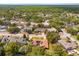 Spacious property with lush greenery and surrounding neighborhood landscape at 413 Sandy Hill Dr, Longwood, FL 32779