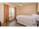 Cozy bedroom with hardwood floors, closet, and window at 413 Sandy Hill Dr, Longwood, FL 32779