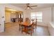 Charming dining area with table, chairs, and view of the entry foyer at 413 Sandy Hill Dr, Longwood, FL 32779
