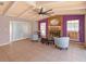 Comfortable living room boasting tile flooring, a brick fireplace, and large windows at 413 Sandy Hill Dr, Longwood, FL 32779