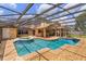 Beautiful pool with hot tub, set in a spacious, screened-in patio area, perfect for relaxing at 413 Sandy Hill Dr, Longwood, FL 32779