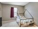 Cozy bedroom featuring a unique metal bed frame and soft carpet at 415 Anne St, Deland, FL 32724
