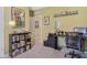 Comfortable bedroom featuring a large window, neutral carpet, and a desk area at 415 Anne St, Deland, FL 32724