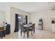 Dining area with sliding glass doors leading to the outdoors and natural light at 415 Anne St, Deland, FL 32724