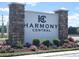 Entrance sign for Harmony Central community with manicured landscaping at 4185 Sagefield Dr, St Cloud, FL 34773