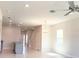 Open floor plan with a view of the kitchen, featuring recessed lighting and lots of natural light at 4185 Sagefield Dr, St Cloud, FL 34773