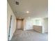 Spacious loft area with neutral carpet and multiple doorways at 4185 Sagefield Dr, St Cloud, FL 34773