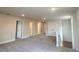 Large upstairs loft area featuring carpeted floors and plenty of natural light at 4185 Sagefield Dr, St Cloud, FL 34773