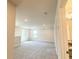 Bright and airy carpeted loft area with recessed lighting, perfect for relaxation or entertainment at 4185 Sagefield Dr, St Cloud, FL 34773