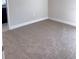 Neutral carpeted bedroom offering a cozy and adaptable space at 4224 Sagefield Dr, Harmony, FL 34773