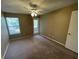Bedroom featuring neutral walls and a window allowing natural light at 5164 Conroy Rd # 1526, Orlando, FL 32811